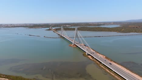 ponte nova do arade suspension bridge crossing rio arade, portimao algarve portugal aerial