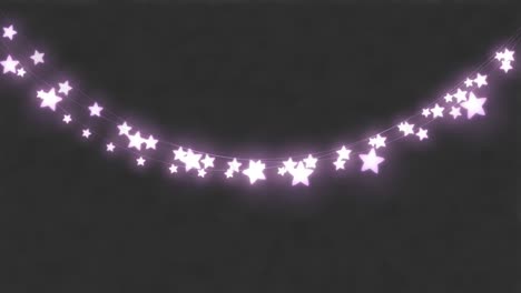 animation of star shaped fairy lights with copy space on grey background