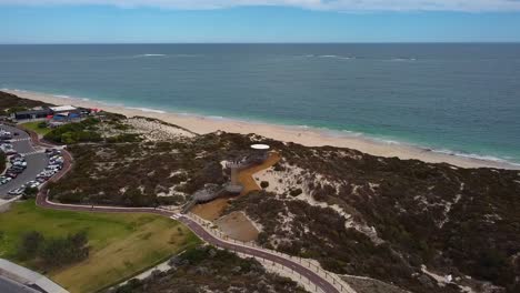 Slow-aerial-orbit-shot-of-Amberton-beach-lookout-tower,-Perth-Australia