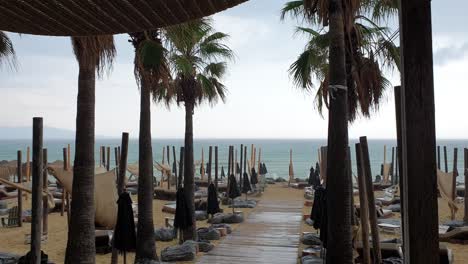 Bad-Weather-and-heavy-wind-at-an-Abandoned-place-on-coast-of-Ammolofoi-Beach-Kavala-in-Greece-Pan-Shot