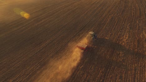 Heavy-Agricultural-Machinery-With-Implements-In-Agricultural-Fields-On-A-Sunny-Summer-Evening-2