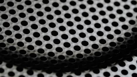 background with perforated holes.