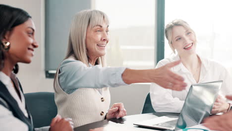 group of businesswomen collaborating during a meeting