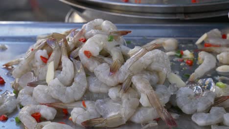 Seasoned-raw-shrimp-sashimi-salad-recipe-cuisine-at-street-food-market-booth-court-documentary