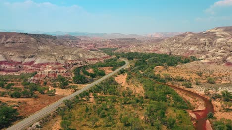 road view to bentonite hills near hanksville, utah, usa