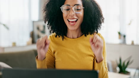 woman with curly hair smiling during a video call