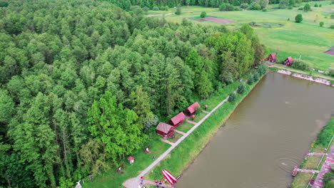 Comfortable suburban resort complex. Swimming pool and bright lush green trees surrounding cozy new development suburb apartment complex