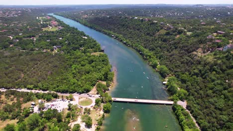 aerial footage of the colorado river near jessica hollis park in austin