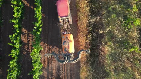 topdown view of a farmer spraying his vineyards with dangerous pesticides near montpellier