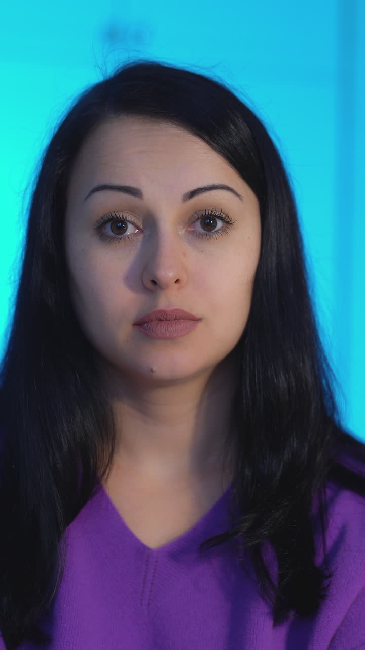 Young woman model looking at camera. Beautiful young woman talking to the camera