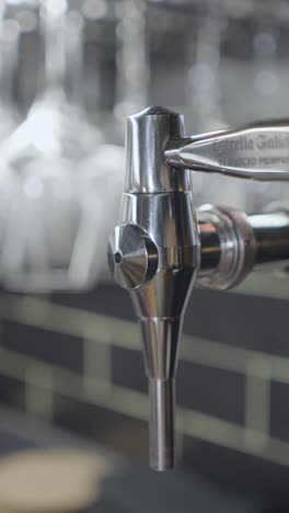 close-up of a beer tap with estrella galicia branding