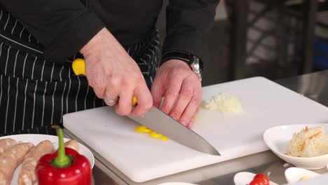 chef chopping vegetables for a dish