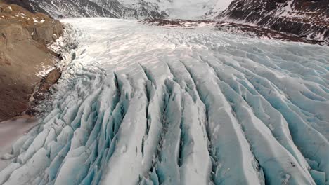 drone shot above vatnajokull glacier in iceland during winter