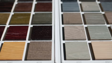 Slider-shot:-Palette-with-painted-wood-samples-to-select-the-color-of-wood-products.