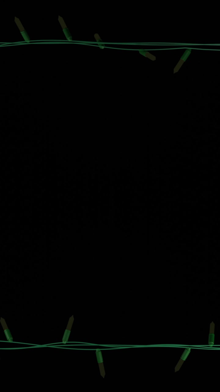 Frame of yellow christmas string lights flashing on black background, copy space