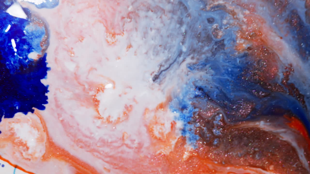 Blue And Orange Ink In Motion Creating Abstract Background