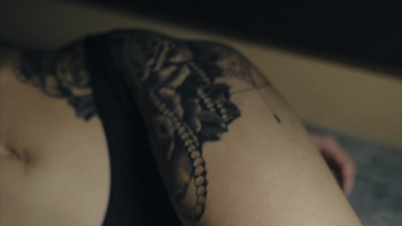 Close-up of tattoos on a woman's body