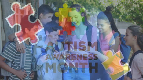 Animation-of-autism-awareness-month-text-and-puzzle-pieces-over-happy-diverse-friends