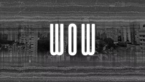 Animation-of-wow-text-in-white-over-distorting-film-of-cityscape