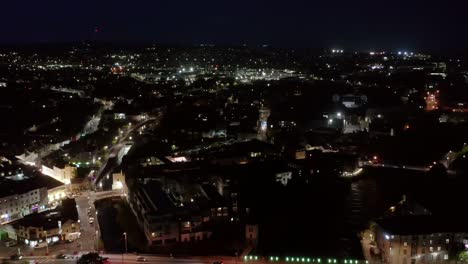 Long-reverse-dolly-of-Galway-night-life-following-the-path-of-the-River-Corrib