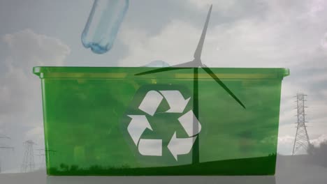 animación de un cartel de reciclaje verde sobre una caja con botellas de plástico y una turbina eólica
