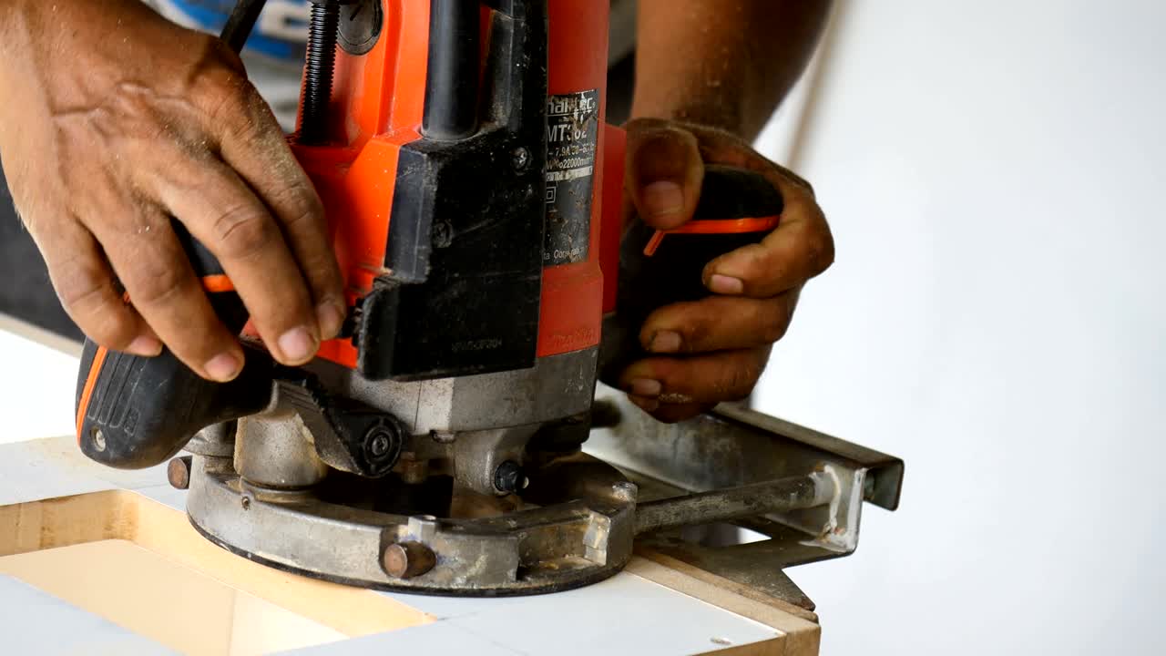 arpenter working on woodworking machines