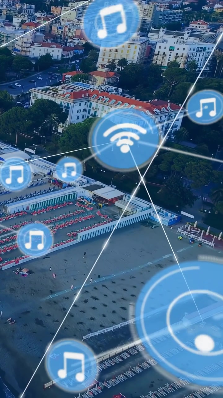 Video verticale: Drone che mappa la tecnologia da spiaggia, nodi Wi-Fi e musicali che raggiungono lettini e visitatori