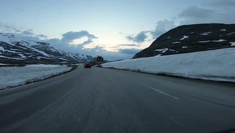 A-scenic-drive-through-the-Norwegian-countryside-following-another-vehicle