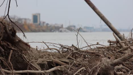 beach with city in background on a cloudy day - static shot