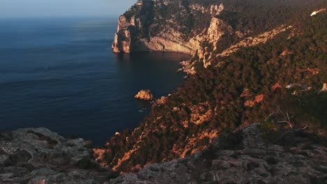 beautiful drone shot of nature and mountains on coast of ibiza, spain