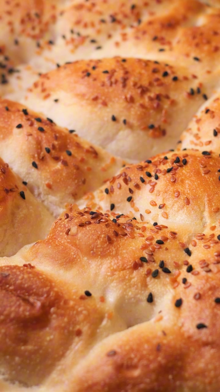 Close-up of Freshly Baked Turkish Pide Bread with Sesame Seeds