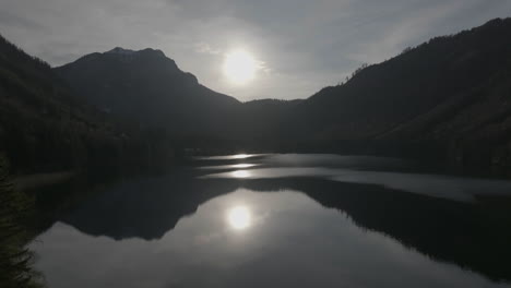 aerial view of serene pristine landscape and lake in alps, langbathsee, upper austria