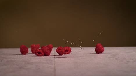 Raspberries hitting the ground in super slow motion 1000fps 4k