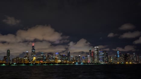 downtown chicago skyline with clouds at night timelapse