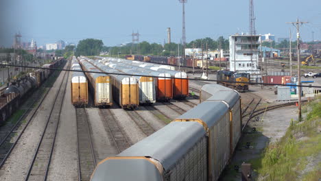 buffalo, new york - august 28, 2021: trains sitting in the rail yard switching station in buffalo, new york