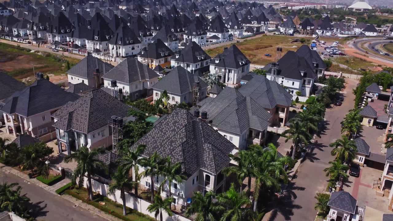 Beautiful aerial of a block of luxury homes in a wealthy suburban neighborhood in Abuja, Nigeria