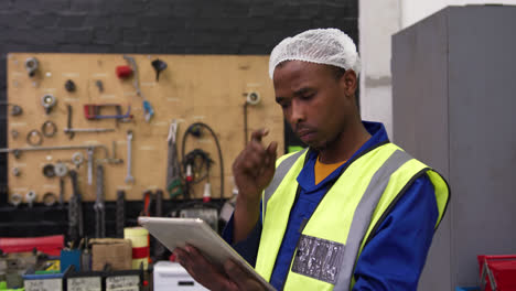 warehouse worker using a digital tablet