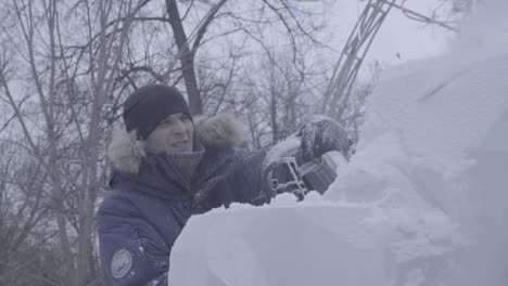 snow sculpting in winter park