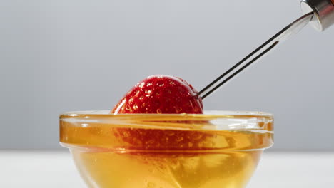 strawberry dipped in honey