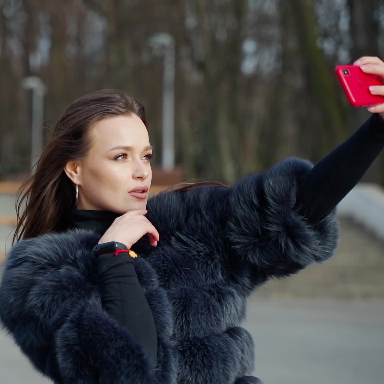 Young woman taking selfie