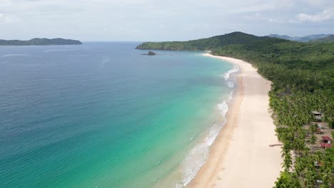 Aerial-dolly-above-nacpan-beach-el-nido-palawan,-panoramic-overview