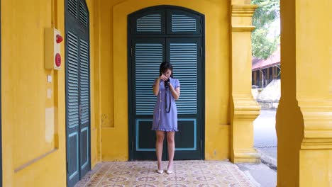 young photographer capturing the design and beauty of the tiled floor