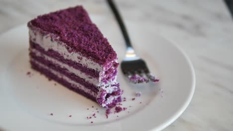 delicious slice of purple layered cake