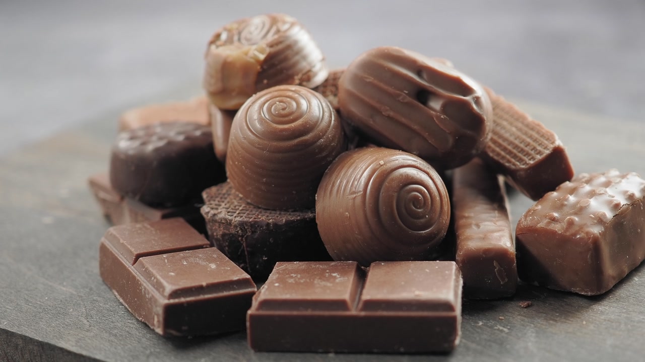Close-up of Assorted Milk and Dark Chocolate Candies and Bars