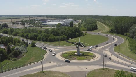 Drone-footage-from-Old-Soviet-MI-24-Helicopter-at-the-roundabout-in-Szolnok,-Hungary