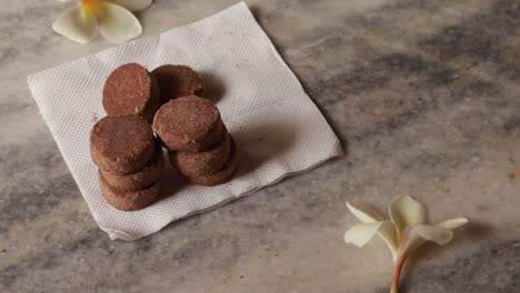 cookies on a conveyor in a confectionery factory oven