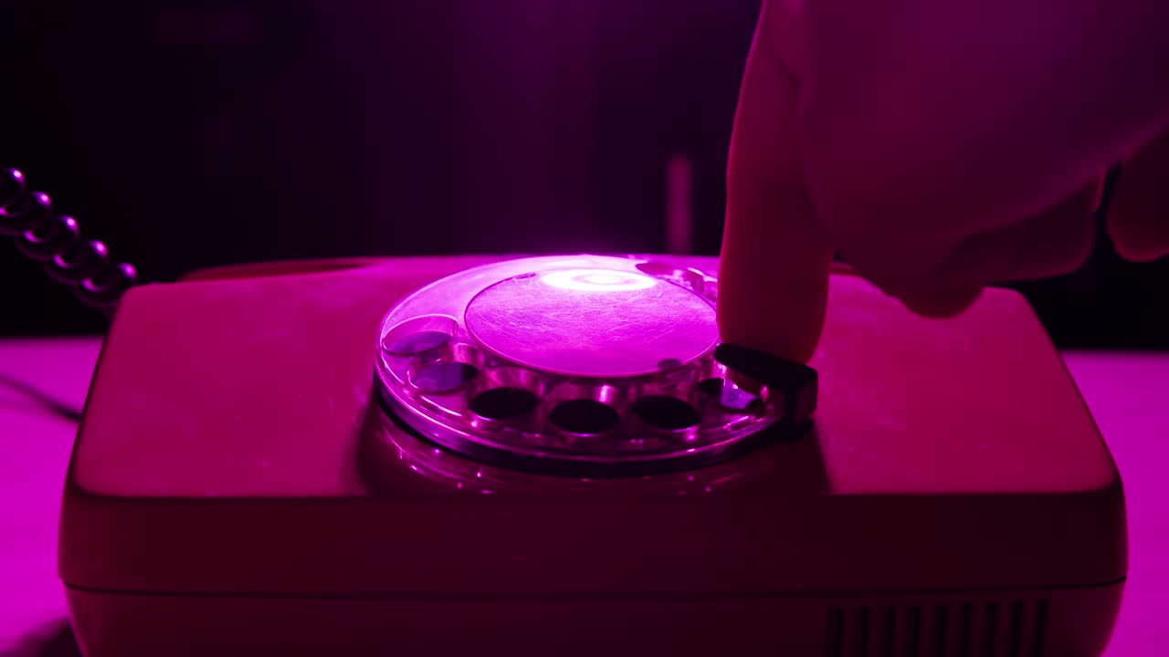 Retro vintage phone, A yellow rotary telephone is displayed on a wooden desk, adding a nostalgic touch