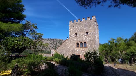 Towering-Fortress-in-the-Heart-of-Ancient-Roman-Butrint-City-Amidst-Serene-Park-with-Lush-Green-Trees,-UNESCO-Treasures-in-Albania