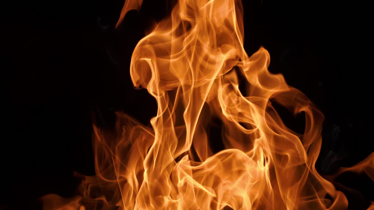 Flames of fire on black background in slow motion. Shot on super slow motion camera 1000 fps.