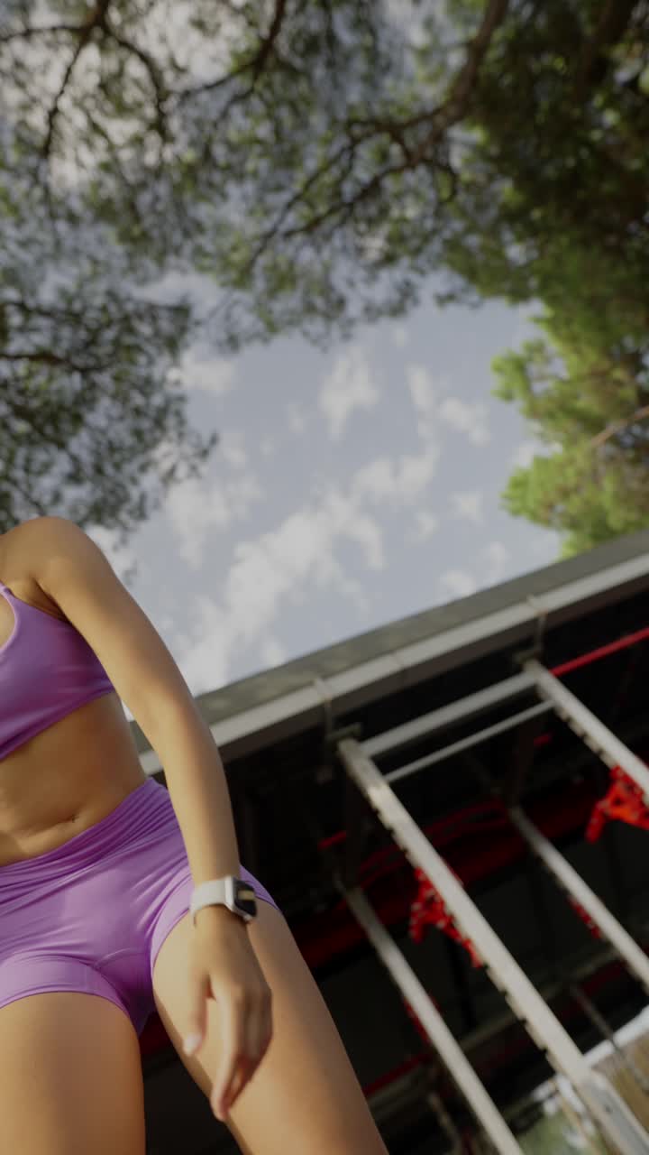 Athletic Woman Exercising Outdoors